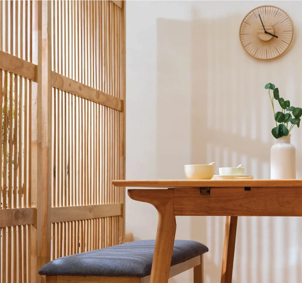 Wood dining table and upholstered chair featured by V Haus Living